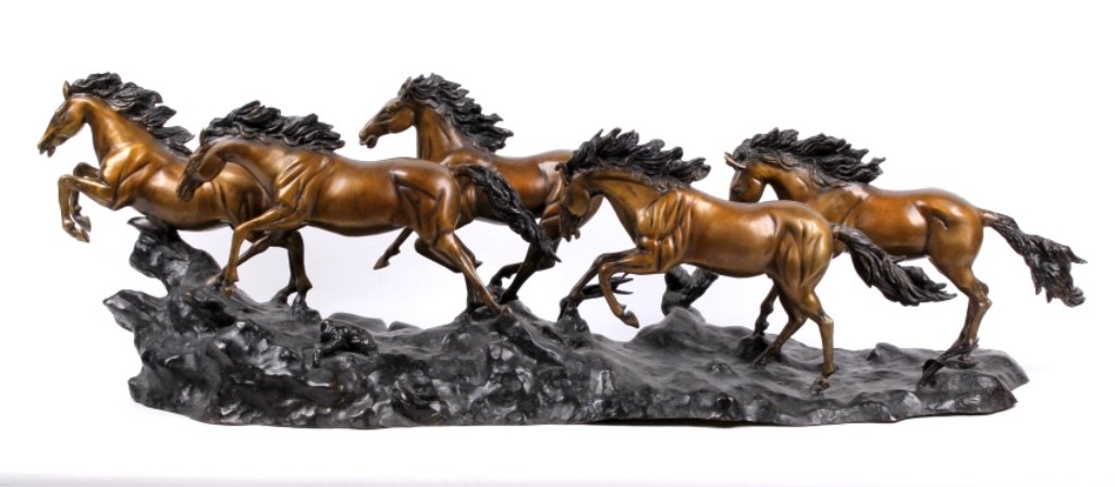 Running Horses Sculpture: This is a very impressive large sculpture of five horses at full gallop with a wonderful bronze patina. This is an aluminum cast piece that is signed in the art. Each horse has an impressive flowing m