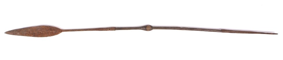 Kuba Kingdom Spear 1800's: This piece is from the 1800's from the Kuba Kingdom in the Congo and is all hand forged iron. This shows a large head, meaning it was most likely from a young warrior. This piece shows a carved wooden