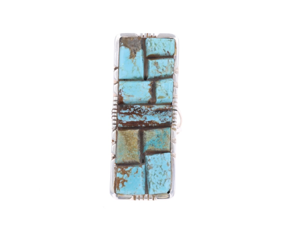 Navajo Ben Begay Sterling Silver Turquoise Ring: Featured in this lot is this sterling silver turquoise ring from Navajo artist Ben Begay. The ring features a wonderfully and professionally crafted sterling silver and cripple creek turquoise constru