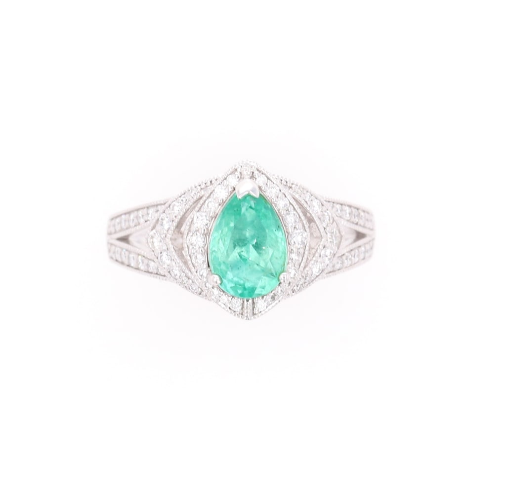 GIA Colombian Emerald VS2 Diamond Platinum Ring: Featured in this lot is this Columbian emerald VS2 diamond platinum ring with GIA and AIGL paperwork. The ring is polished, stamped, and tested platinum construction that is marked Oscar Friedman. The