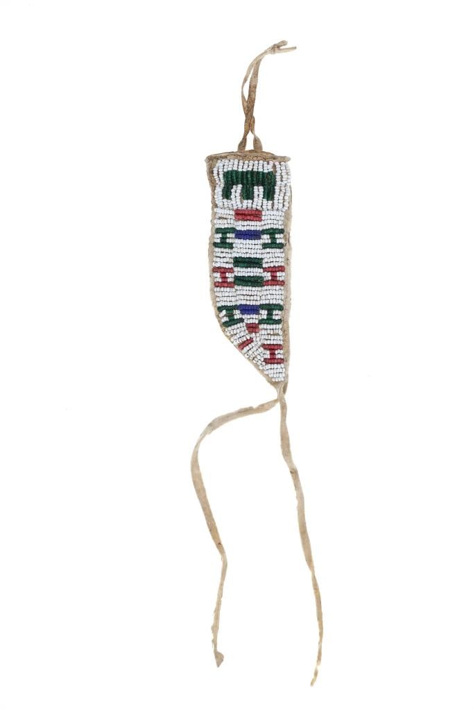 ca. 1870 Sioux Beaded Knife Sheath ex-Manitou: The lot features a fantastic circa 1870-1880's Sioux Beaded Indian Hide sinew sewn sheath from a child or woman with a provenance card from ex-Manitou March in Montana circa 2001. The piece is compris