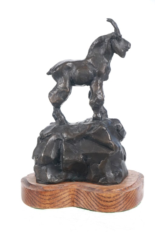 Signed Gary Schildt Bronze Mountain Goat Sculpture: Featured in this lot is an Original Signed Gary Schildt Bronze Mountain Goat Sculpture, 1984, Limited Edition. Gary Joseph Schildt (1938-2021), also known by his Blackfeet name "Lone Bull," was a reno