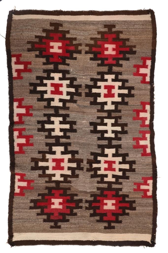 ca. 1920 Navajo Ganado Eye Dazzler Rug: Featured in this lot is this Navajo Ganado Eye Dazzler rug circa 1920's. The rug features a wonderfully and professionally crafted hand woven wool construction that shows an abnormally soft demeanor. 
