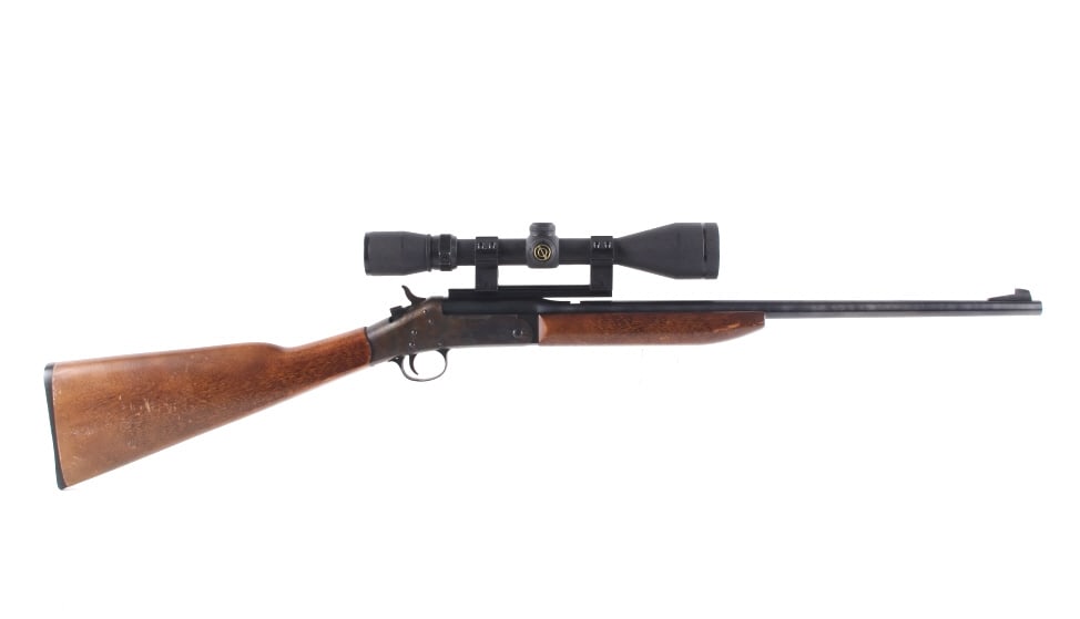 Harrington & Richardson Model 158 .22 Hornet Rifle: Featured in this lot we have a Harrington & Richardson model 158 break action single shot rifle chambered in .22 hornet and comes with simmons scope. The rifle displays a 22" long round barrel, walnut