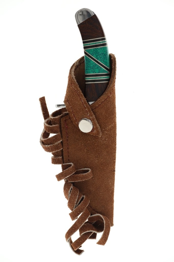 Trailing Point Knife W/ Turquoise Inlay Handle: Featured in this lot is this beautifully crafted, stainless steel blade and inlaid turquoise handle knife. This knife features a sharpened, stainless steel trailing point blade and is marked with a ro