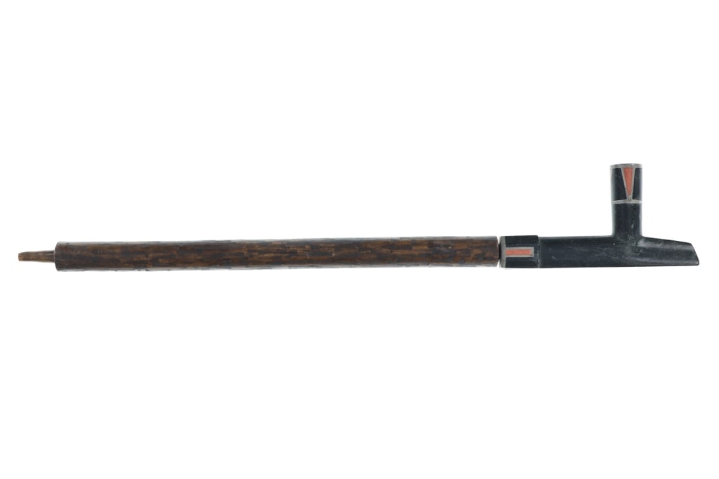 Circa 1860 Lakota Sioux Inlaid Pipe and Stem: This is a beautiful and artful circa 1860 Sioux black stone inlaid pipe and stem from the Lakota Sioux of South Dakota collected from the Pine Ridge Indian Reservation; from the ex-Ted Levy and Mike K