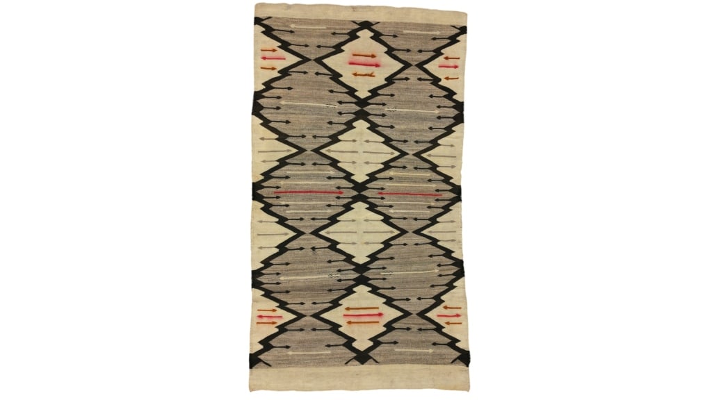 c. 1890-1920's Navajo Crystal Eye Dazzler Rug: Featured in this lot is this Navajo Crystal Eye Dazzler rug circa 1890 to 1920's. The rug features a wonderfully and professionally crafted wool construction that shows a Crystal Eye Dazzler design th
