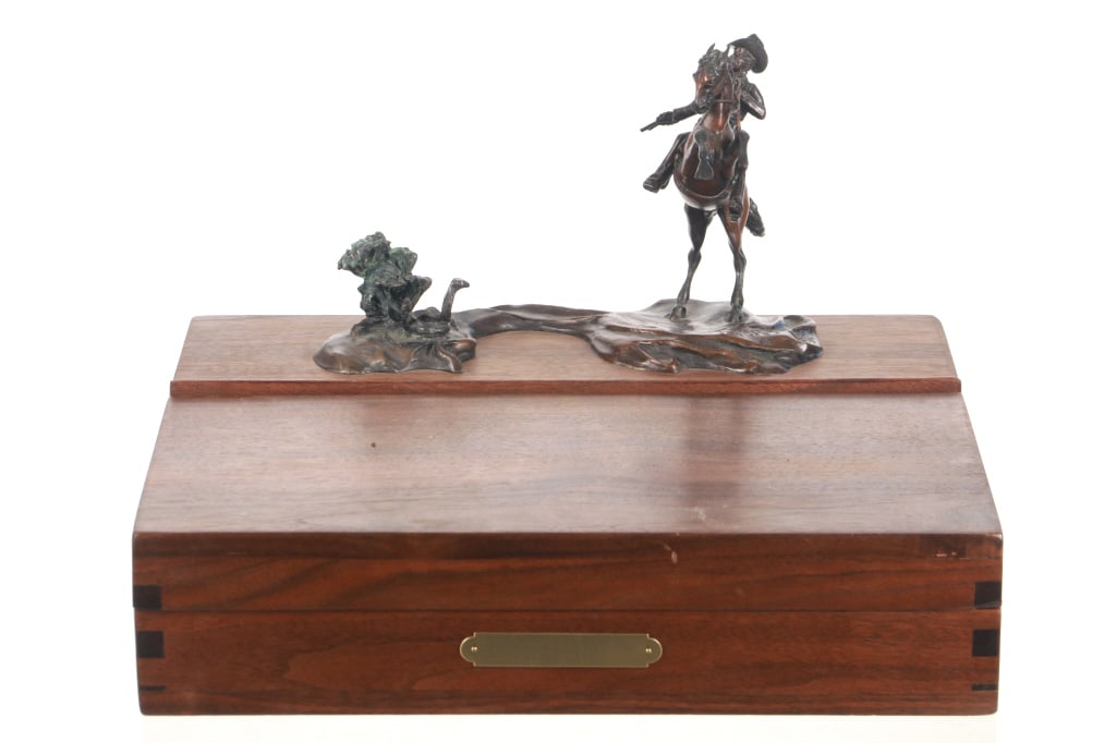 Custom Colt Cavalry Action Revolver Walnut Case: Featured in this lot is this Colt Cavalry Action Revolver Vintage Custom Bronze Sculpture Solid Walnut Hard Case, circa 1992. This case features a Limited Edition Bronze after Frederic Remington's "Th
