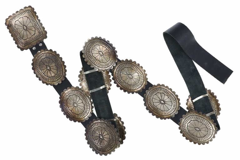 Navajo Second Phase Sterling Silver Concho Belt: This is a Fabulous Old Pawn Navajo Second Phase Sterling Silver Concho Belt, circa 1880-1900. The concho belt displays ten scalloped edge oval conchos with beautifully intricate stamped designs, the s