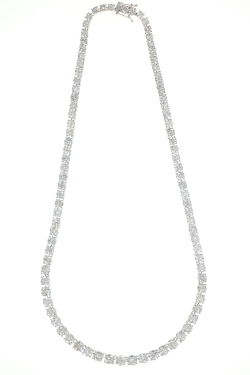 Exceptional 39.32 ct. Diamond Designer Necklace: This is a truly stunning Oscar Friedman designer necklace set with an astounding 39.32 carats of natural Diamonds in platinum with GGA paperwork. The necklace shows a total of 90 round brilliant cut n