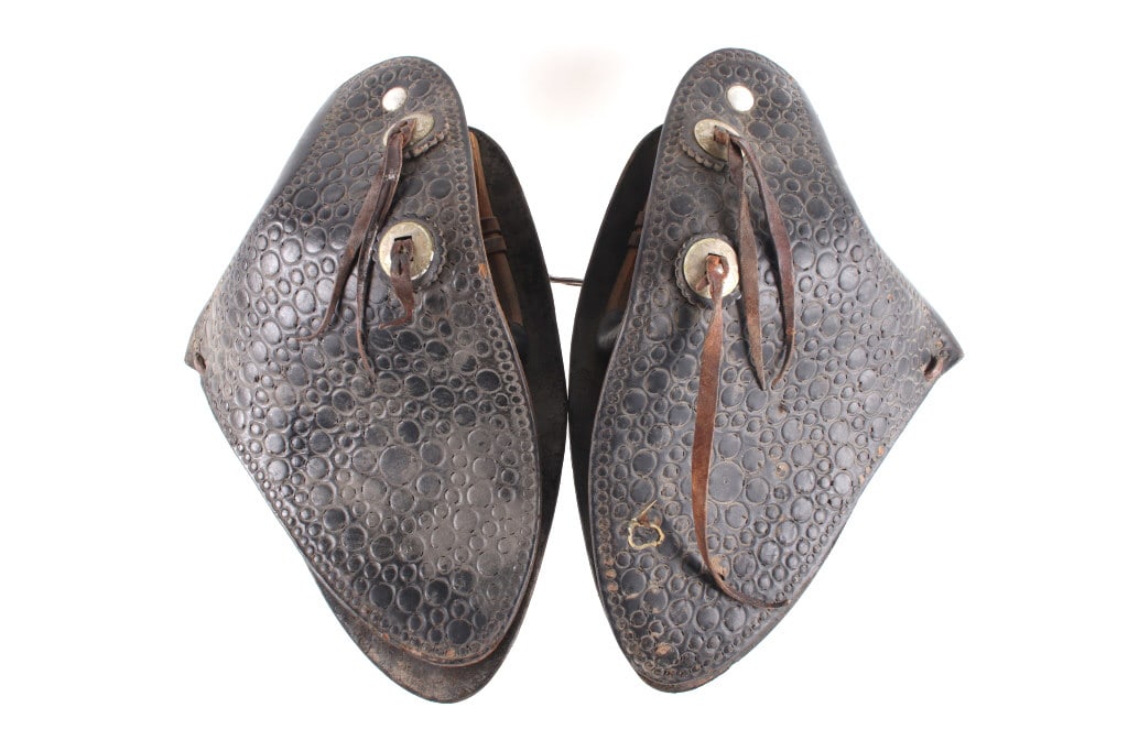 Al Furstnow Tooled Leather Western Tapadero Set: Featured in this lot is this pair of tooled leather western tapaderos attributed to Al Furstnow. This pair of tapaderos is almost identical to a pair of tapaderos made by Al Furstnow, although unmarke