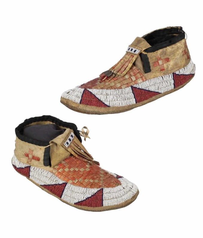 c. 1870 Sioux Pictorial Quilled & Beaded Moccasins: This is an exceptional rare set of pictorial quilled and beaded circa 1870 with buffalo hide and hard sole bottoms. Moccasins with pictorial quillwork are immensely rare and desirable with this being 