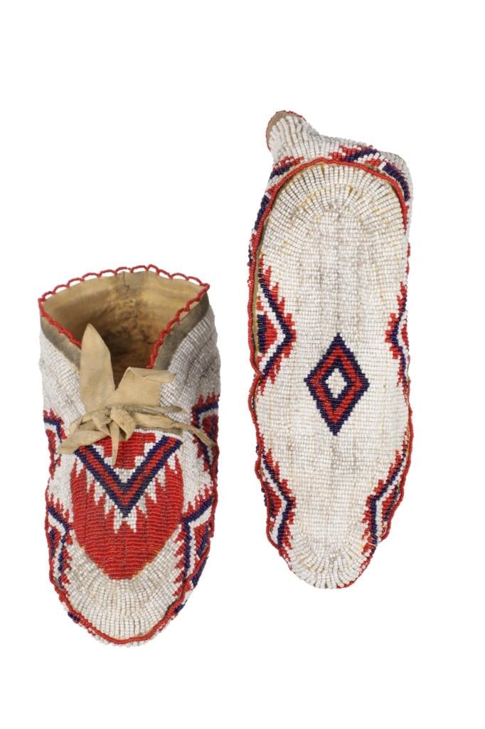 19th-Cent. Sioux Ceremonial Fully Beaded Moccasins: This is a wonderful set of ceremonial completely / fully beaded moccasins from the Sicangu Brule Sioux of the Rosebud Indian Reservation from the 19th Century. The set shows Indian tanned buffalo / bi
