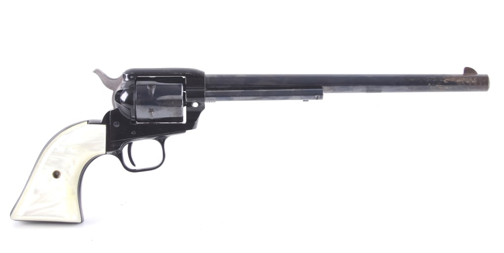 Colt Frontier Scout Buntline '62 .22LR Revolver: Featured in this lot we have a Colt Frontier Scout Buntline '62 single action revolver chambered in .22 long rifle with the original box. The piece was manufactured in 1963 by Colt. The revolver displ