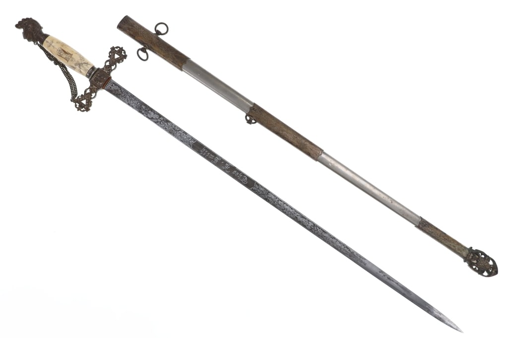 Henderson-Ames Co. Knights Templar Sword 1890s: Featured in this lot is this 1890s, Knights Templar sword, crafted by Henderson-Ames Company in Kalamazoo, Michigan. The blade is engraved on the ricasso with the company's name reading, "Henderson-Am