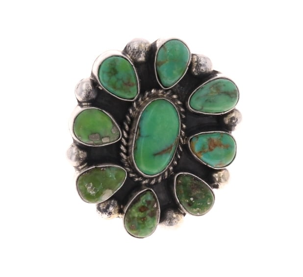 Navajo Sierra Bella Turquoise M. James Ring: Featured in this lot is this sterling silver Sierra Bella Turquoise ring from Navajo artist Marcella James. The ring features a wonderfully and professionally crafted sterling silver and Sierra Bella 