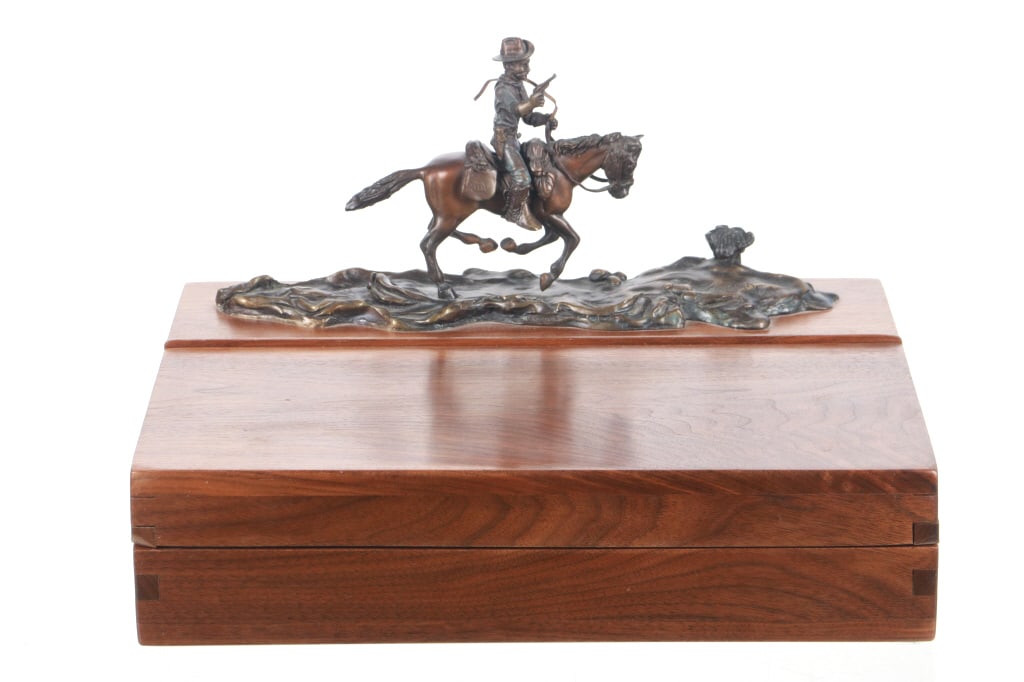 Custom Colt Cavalry Action Revolver Walnut Case: Featured in this lot is this Colt Cavalry Action Revolver Vintage Custom Bronze Sculpture Solid Walnut Hard Case, circa 1992. This case features a Limited Edition Bronze after Frederic Remington's "Co