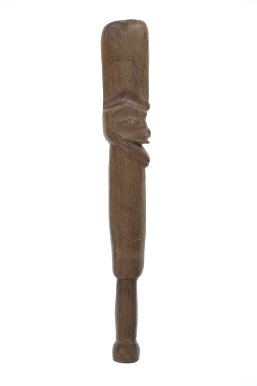 19th C. Tlingit Halibut Fishing Club - Kumugwe: The lot features a fantastic 19th Century Tlingit Northwest Coast halibut fishing club showing the Kumugwe mythical ocean chief of the Pacific Northwest. The club exhibits solid wood carved with a cla