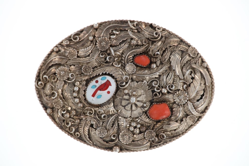 Western Inlaid Silver Red Branch Coral Buckle: Featured in this lot is this western inlaid Mexican silver red branch coral buckle circa 1950's. The buckle features a wonderfully and professionally crafted Mexican silver construction that shows in