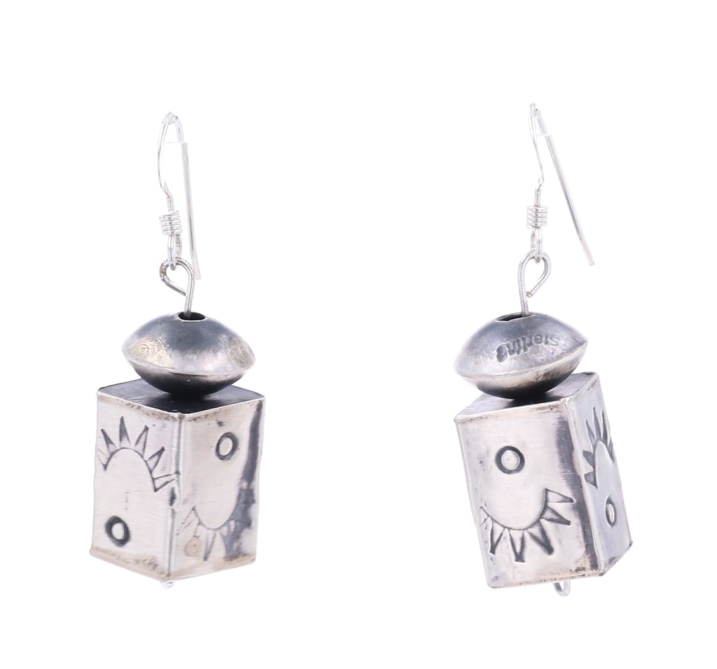 Navajo Tysha Aparicio Sterling Silver Box Earrings: Featured in this lot is this sterling silver box earrings from Navajo artist Tysha Aparicio. The earrings feature a wonderfully and professionally crafted sterling silver construction that shows a