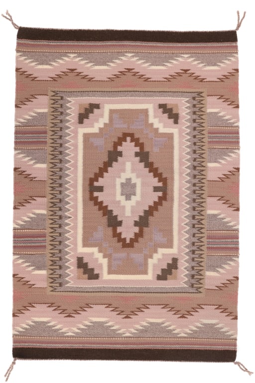 Navajo Louise Yazzie Burntwater Crystal Rug c1970s: Featured in this lot is this Burntwater Crystal circa 1970's rug from Navajo weaver Louise Bia Yazzie born in 1953. The rug features a wonderfully and professionally hand woven wool construction that