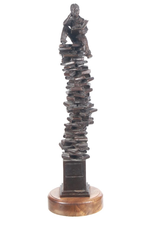Alan Cottrill (Born 1952) "Boy on Books" Bronze: Featured in this lot is this bronze sculpture called "Boy on Books" circa 2004 by Ohio artist Alan Cottrill born in 1952. The sculpture features a wonderfully and professionally crafted bronze