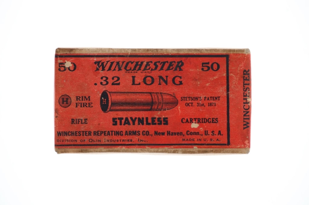 Winchester .32 Long Rim Fire Staynless Cartridges: Featured in this lot is this box of Winchester .32 long rim fire Staynless cartridges circa 1871. The box of ammunition features its original box (seal broken) with the correct ammunition at a total
