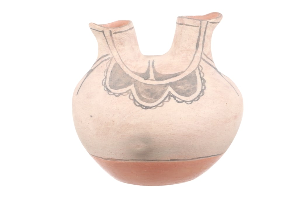 Acoma Pueblo Polychrome Wedding Vase c. 1940s: Featured in this lot is this Acoma Pueblo polychrome wedding vase circa 1940's. The wedding vase features a wonderfully and professionally crafted ceramic construction that shows the iconic double spo