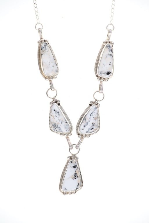 Navajo Silver White Buffalo Turquoise Necklace: Featured in this lot is this sterling silver and White Buffalo Turquoise necklace from Navajo artist Cynthia Begay. The necklace features a wonderfully and professionally crafted sterling silver and w