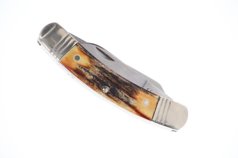 Ca. 2005 Cattaraugus K.C.C. 35th Paratrooper Knife: Featured in this lot is this Cattaraugus K.C.C. 35th "Paratrooper" knife circa 2005. The pocket knife is wonderfully and professionally crafted stainless steel and genuine stag horn siding constructio