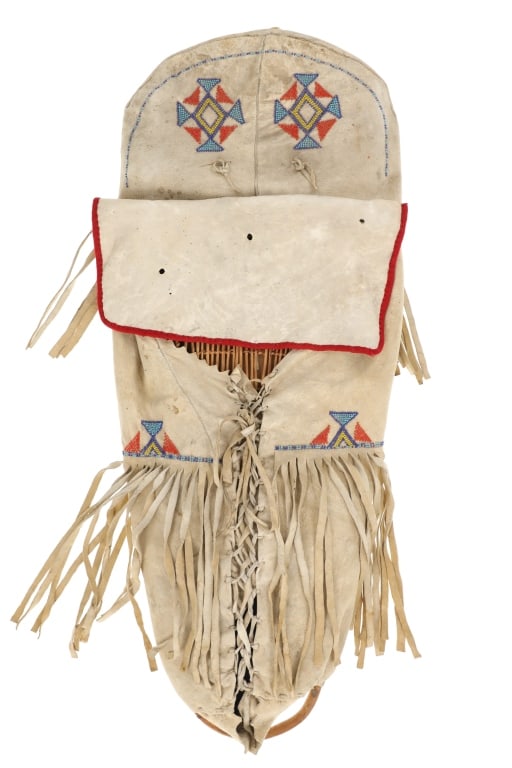 ca. 1890-1900 Paiute Beaded Basketry Cradle Board: The lot features a fantastic circa 1890-1900's beaded Indian hide basketry cradle board papoose from the Paiute from the Warm Springs Indian Reservation of Oregon. The piece shows an Indian tanned buc