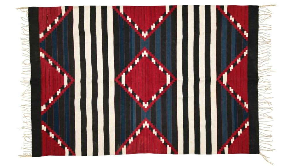 Chief's Blanket Third Phase Rug - Pedro Sosa: Featured in this lot is this excellent handwoven flat weave rug by master weaver Pedro Sosa using 100% soft fine handspun wool in an amazing Third Phase Chief?s Blanket pattern. The rug was handwoven 