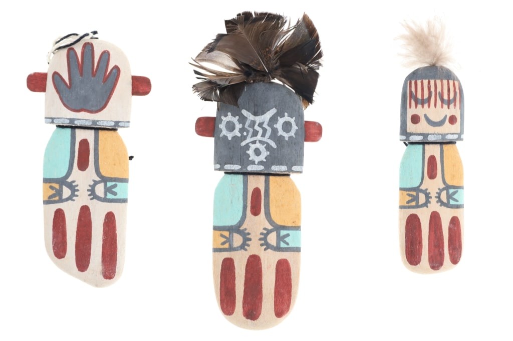 Hopi Putsqatihu or Cradle Doll Polychrome Kasina's: Featured in this lot is this collection of Hopi Putsqatihu or Cradle Dolls polychrome Kasina's circa 1960's. There are three Kasina's in this collection. The three Kasina or Kachina's show flat doll d