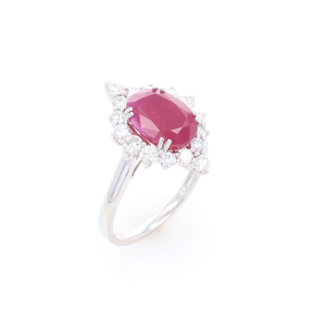 GIA RARE NO Heat Ruby Diamond Platinum Ring: Featured in this lot is this unheated ruby diamond platinum ring with GIA and AIGL paperwork. The ring features a polished, stamped, and tested platinum construction that is marked on the inside of th