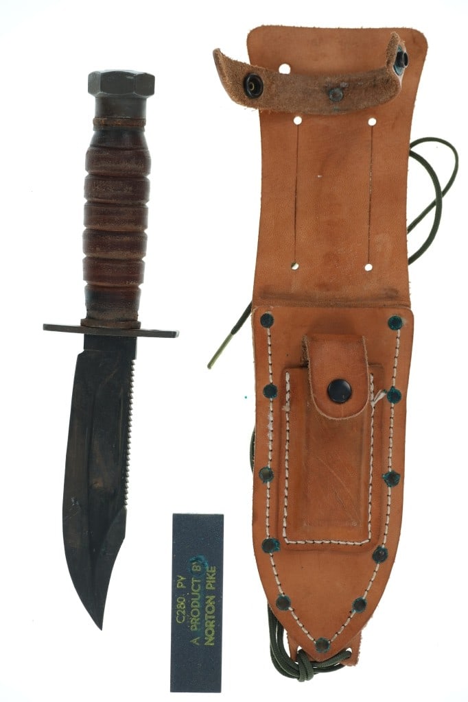 Jet Pilot's Survival Knife w/ Norton Stone 1960s: For your consideration is this Vietnam era Jet Pilot's Survival knife with leather sheath and Norton Pike sharpening stone from the 1960s. The Vietnam-era pilot survival knife, often called the "Jet P