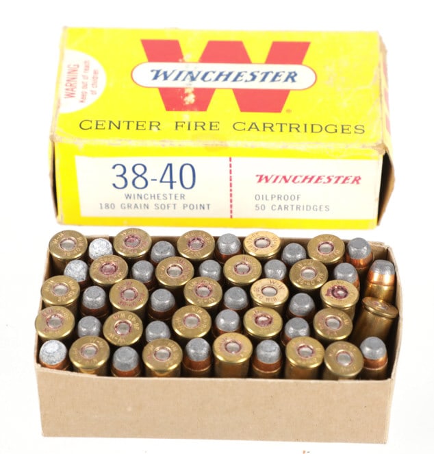 Winchester .38-40 Center Fire Cartridges (50): Featured in this lot is this box of Winchester .38-40 Center Fire Cartridges (50). The box of ammunition shows the proper cartridges and proper number for the size of the original box and is marked