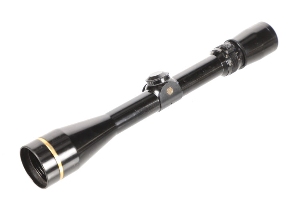 Leupold Model VARI-X III 3.5x10 Rifle Scope: Featured in this lot is this Leupold model VARI-X III 3.5x10 rifle scope. The scope features a flat black coloration with windage and elevation knobs and their covers and sight adjustment knob close