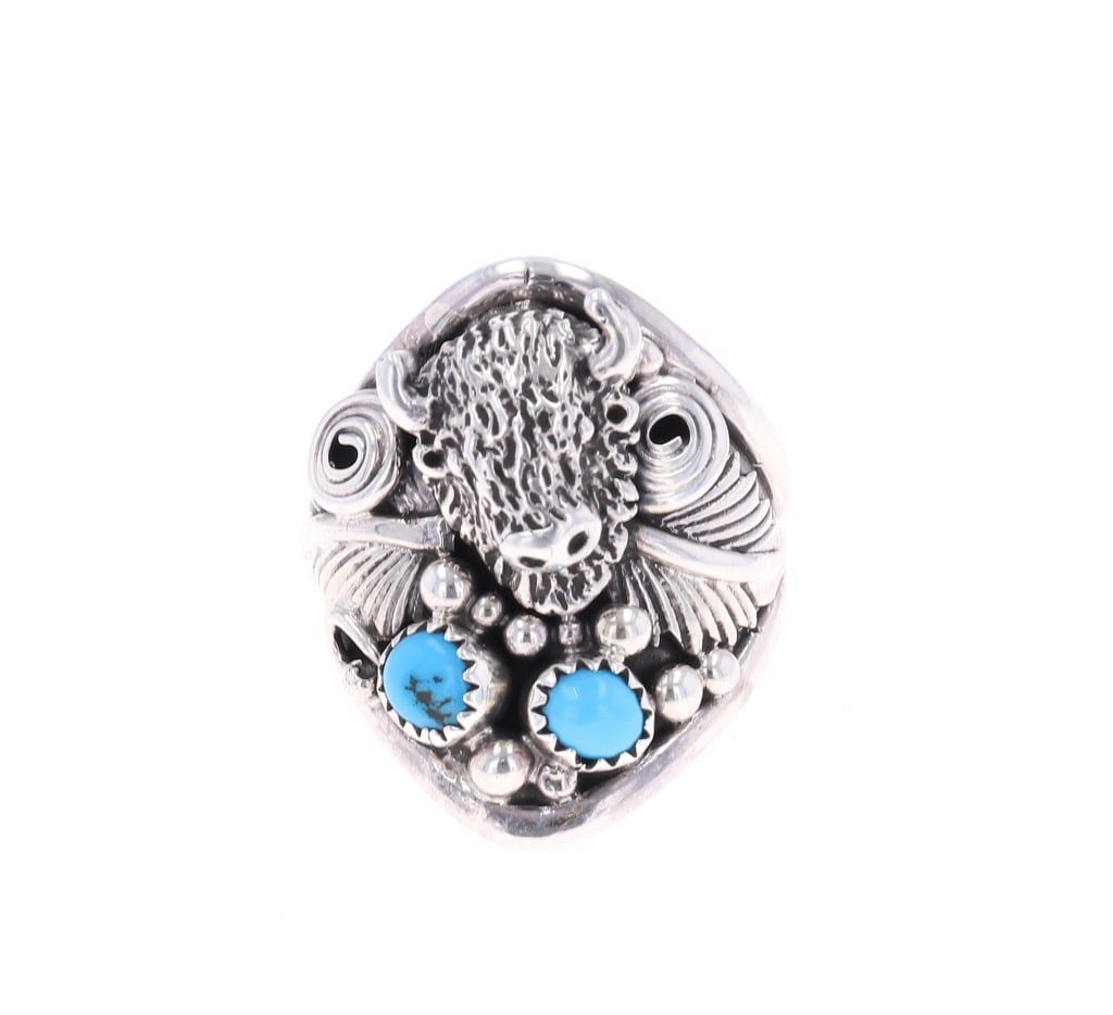 Navajo D. Wood Sterling Silver Turquoise Ring: Featured in this lot is this sterling silver turquoise ring from Navajo artist Daniel Wood. The ring features a wonderfully and professionally crafted sterling silver construction that shows a