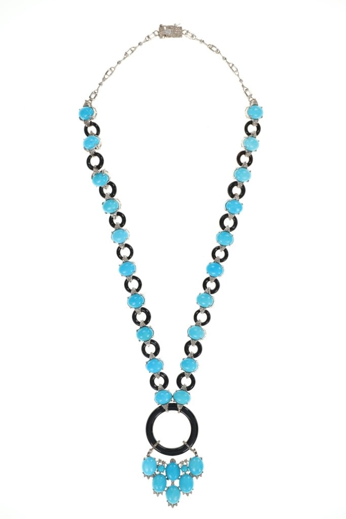 Antique Art Deco Turquoise, Onyx, & Diamond Set: The lot features an antique to vintage Art Deco pattern necklace and earring set showing Turquoise, Black Onyx and natural Diamonds in sterling silver. The piece comes with a GGA report and appraisal 