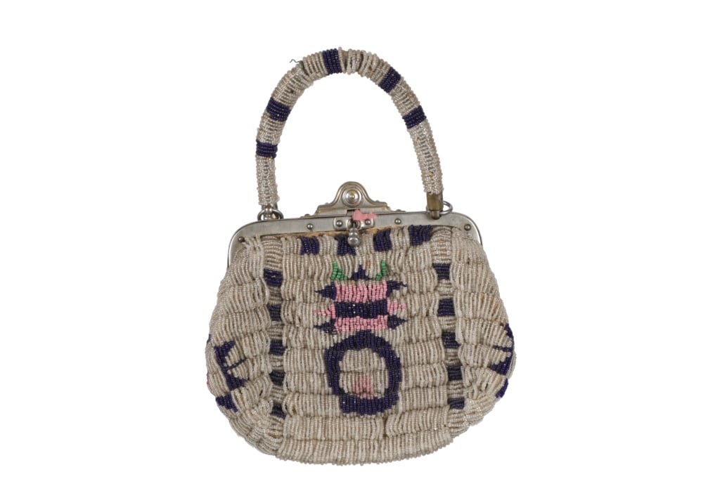 ca. 1890 Lakota Sioux Pictorial Fully Beaded Purse: This is a beautiful Late 19th Century Lakota Sioux pictorial fully beaded Indian hide sinew sewn purse from the ex-Morning Star Gallery Santa Fe, NM and Montana collections. The purse exhibits Indian 