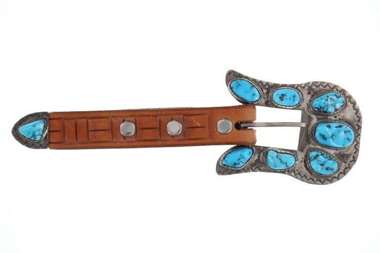Navajo Sterling Silver Turquoise Ranger Buckle: Featured in this lot is this Navajo sterling silver turquoise ranger buckle circa 1960's. The buckle features a wonderfully and professionally crafted sterling silver and Kingman Turquoise cabochon se