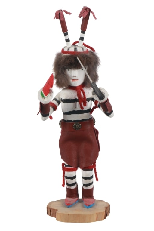 Hopi Watermelon Clown Kachina by L. Silversmith: Featured in this lot is this Hopi "Watermelon Clown" Kachina or Koshare by Leo Silversmith circa 1980's. The Kachina features a wonderfully and professionally crafted wood, hide, and fur tuff construc