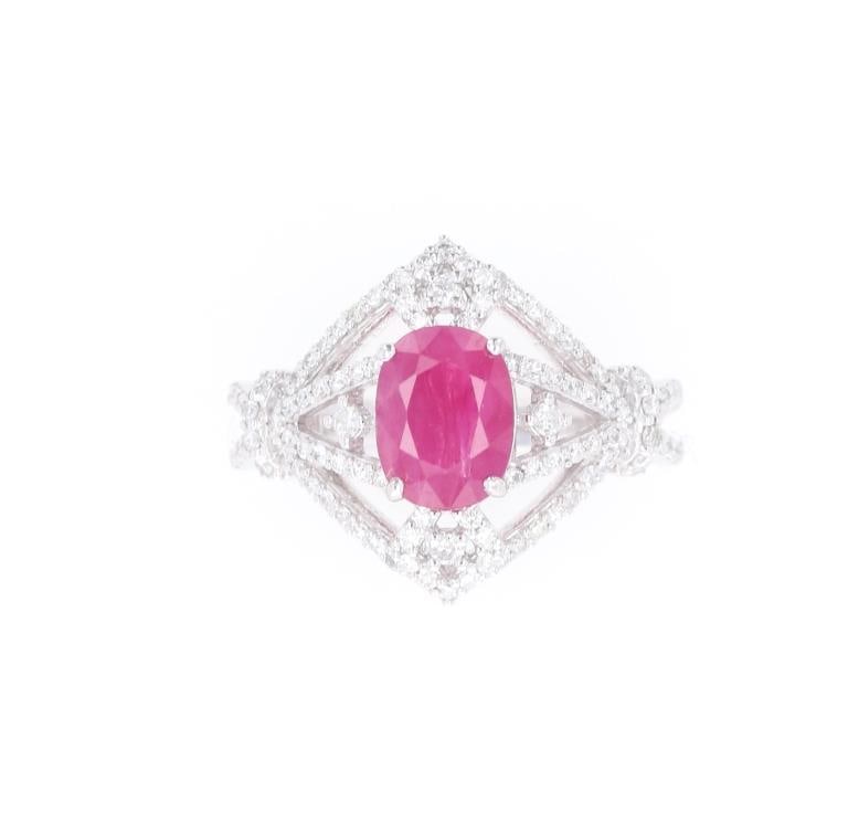 Rare Burmese Ruby GIA Certified Designer Ring: The lot features a designer platinum ring set with a rare Burmese Myanmar Ruby with GIA certificate with VS2 diamonds signed by Aaron Gofflieb designer. The ring shows a center stone with 1.84 carats 