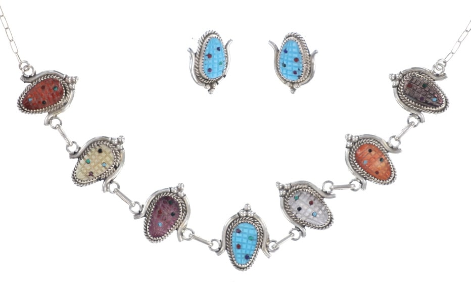 Zuni Tracy Bowekaty Silver Corn Necklace & Earring: Featured in this lot is this Zuni Tracy Bowekaty Sterling Silver Gem Corn Turquoise Necklace and Earrings. The pieces feature a vibrant palette of hand-cut stones, including turquoise, coral, mother o