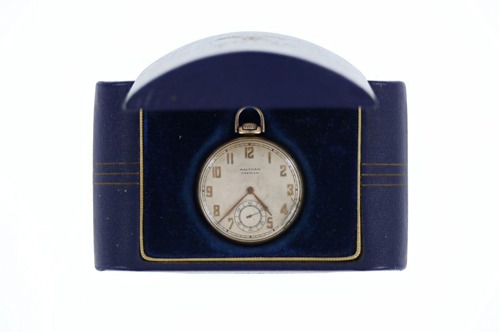 Waltham Premier Model 1924 10K Gold Pocket Watch: Featured in this lot is this Antique Waltham Premier, Model 1924 Col. B, Grade No. 217 pocket watch with 10 Karat Yellow Gold Filled AG Waltham Premier Keystone J. Boss case. The watch features a dome