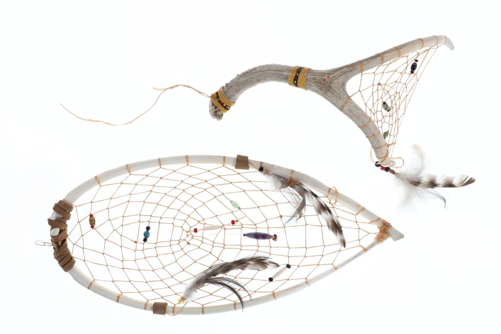 20th C. Sioux Elk Rib & Deer Antler Dream Catchers: Featured in this lot is this Lakota Sioux elk rib and deer antler dream catchers circa 20th century. There are two dream catchers in this collection the first is made from two elk ribs for the frame a