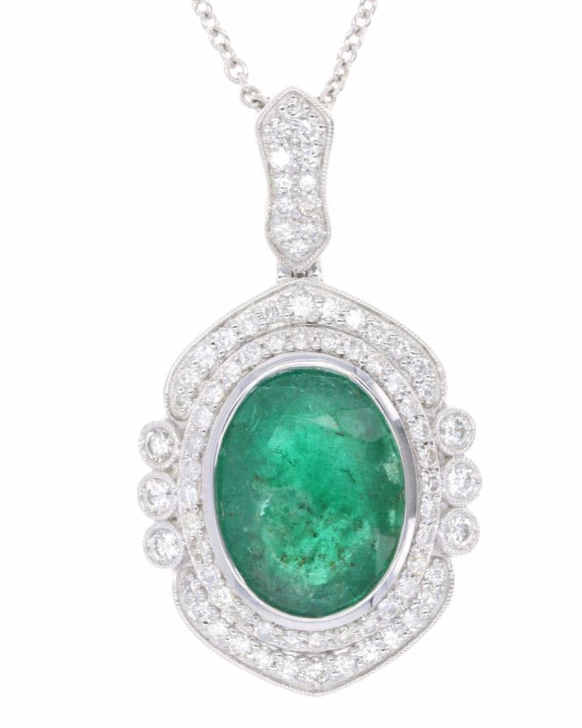 Designer Sheffield 7.32 ct. Emerald Platinum Neckl: The lot features a 7.32 carats natural Emerald with rich green coloring set in a designer Sheffield & Sons Platinum necklace with VS1 natural Diamonds and paperwork. The center stone shows a 7.32 cara