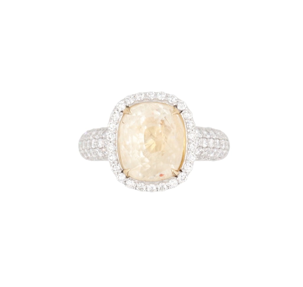 7.27 ct. Yellow Sapphire Designer Platinum Ring: The lot features a GIA Certified no heat natural Yellow Sapphire 7.27 carats set in an Oscar Friedman Platinum and 18K gold signed ring with papers. The center stone is 7.27 carats with GIA Sapphire R