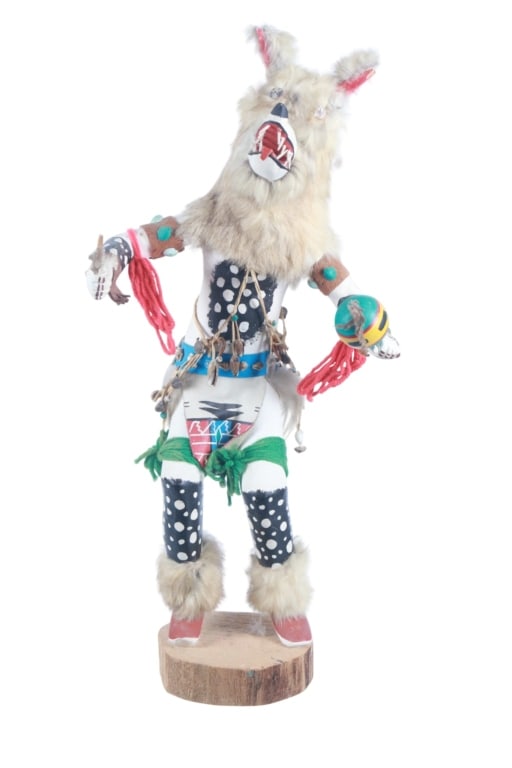 Ca. 1950's Hopi "Wolfman or Kweo" Kachina Doll: Featured in this lot is this Hopi "Wolfman or Kweo" Kachina doll circa 1950's. This Kachina doll features a wonderfully and professionally crafted wooden, hide, trade sting, shell, and rabbit fur cons