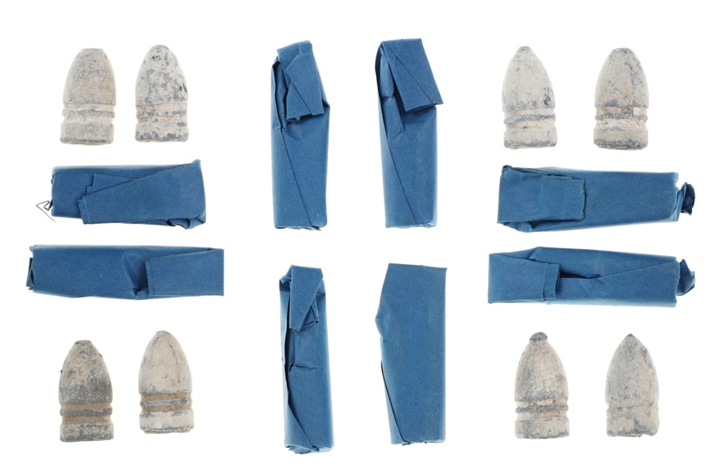 c1860 Civil War Black Powder Bullets & Powder Cart: Featured in this lot is this Civil War black powder bullets and powder cartridges circa 1860. The artifacts feature a wonderfully and professionally crafted lead and black powder construction that sho